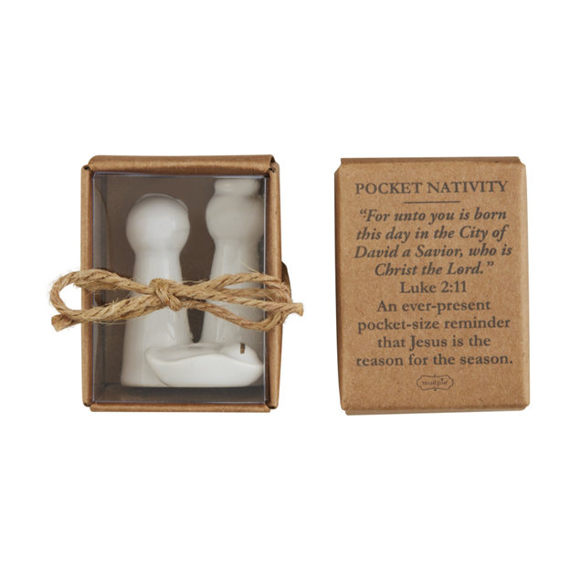 Pocket nativity set with a cardboard box containing religious text on a white background