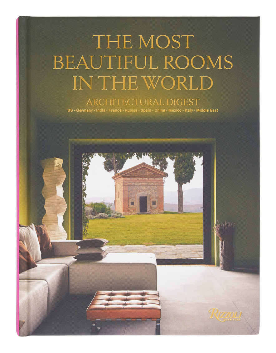 Book cover of 'The Most Beautiful Rooms in the World' by Architectural Digest with a modern interior design on the cover.