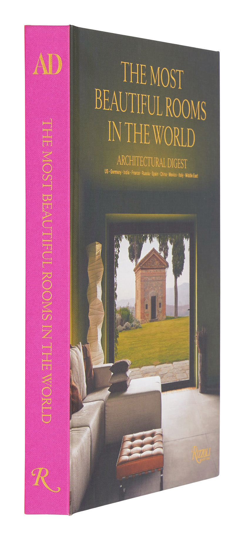 Book titled 'The Most Beautiful Rooms in the World' by Architectural Digest with a pink spine and interior view of a room.