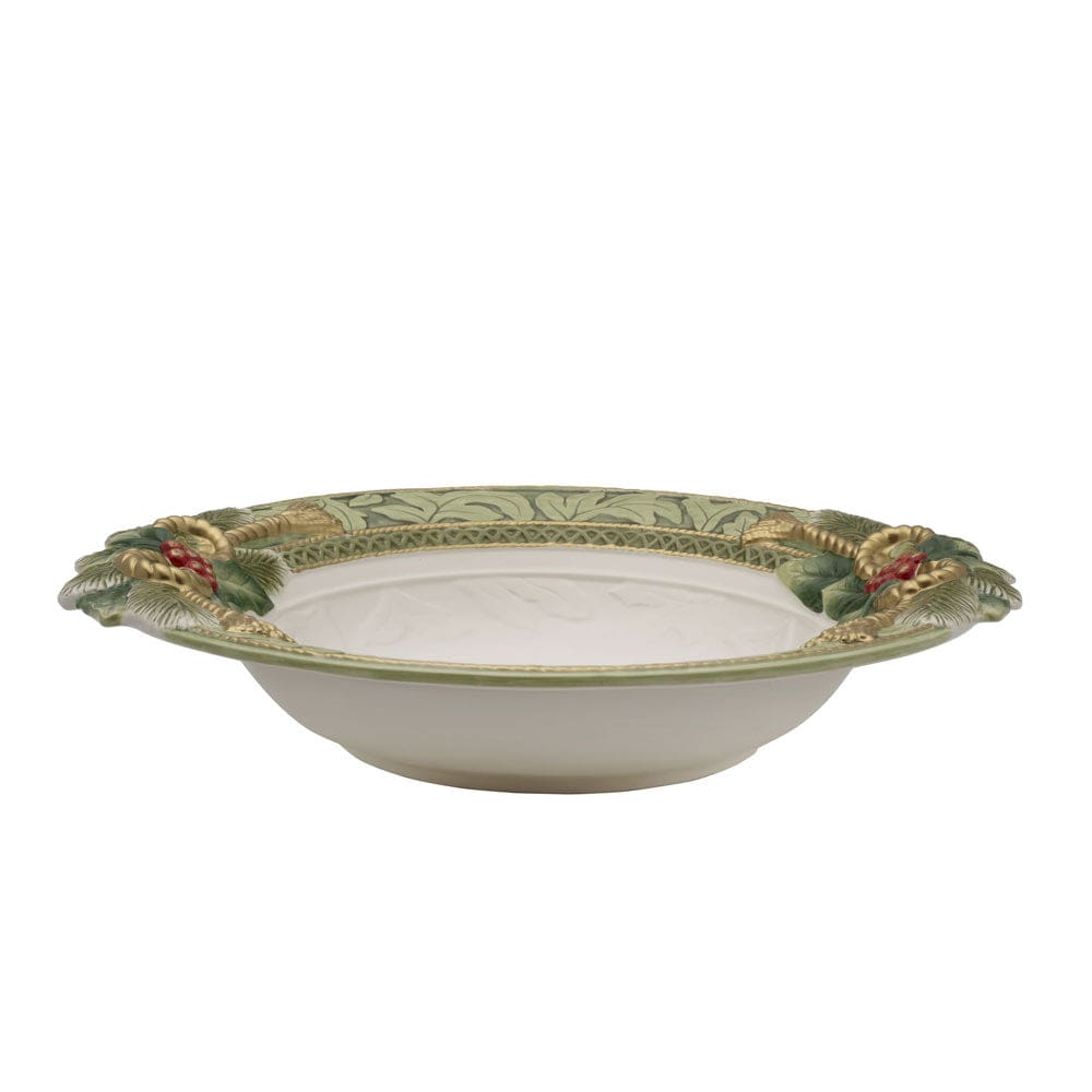 Decorative ceramic bowl with green rim and floral design on a white background