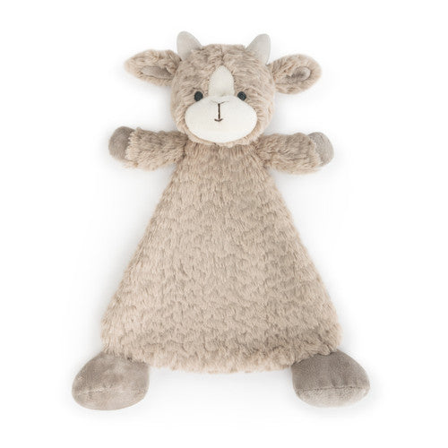 Plush toy goat on a white background