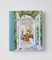 Book titled 'Beautiful: All-American Decorating and Timeless Style' by Mark d. Sikes on a white background