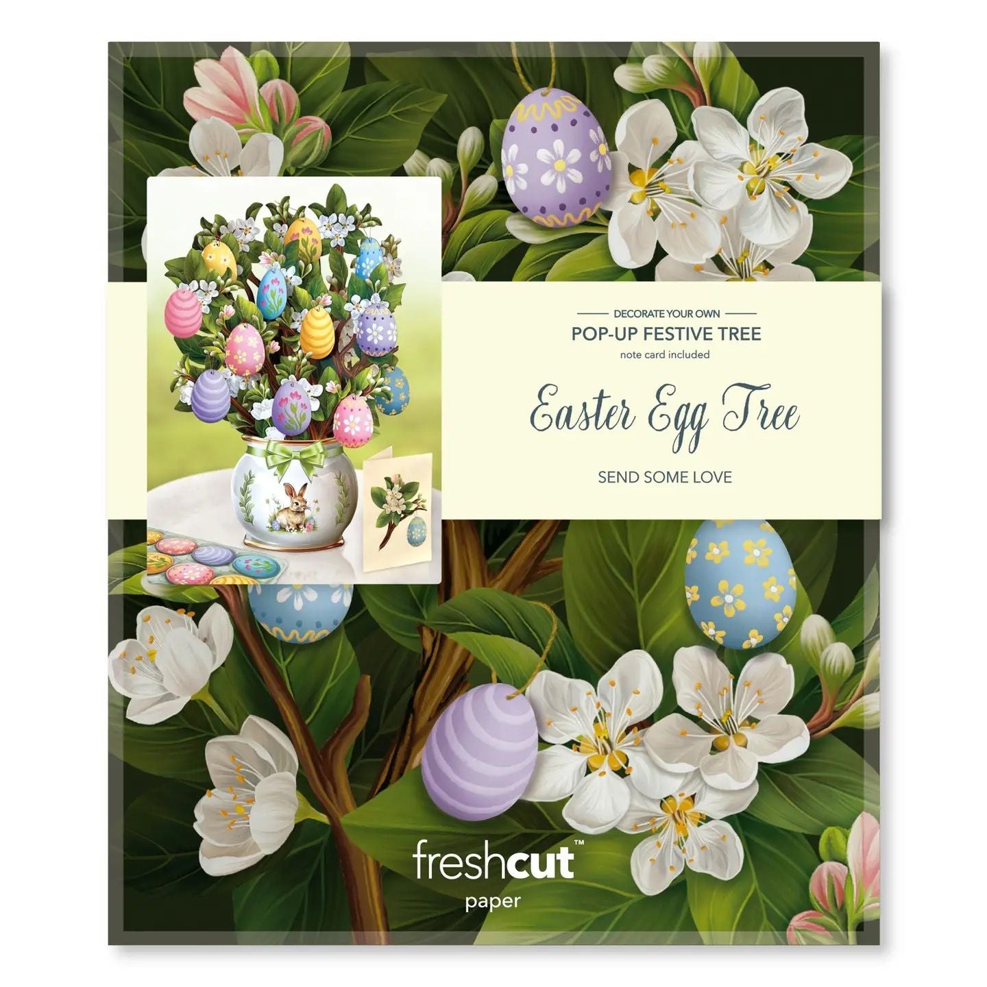 Easter egg tree kit with flowers and decorative eggs on a green leafy background, featuring 'fresh cut paper' branding.
