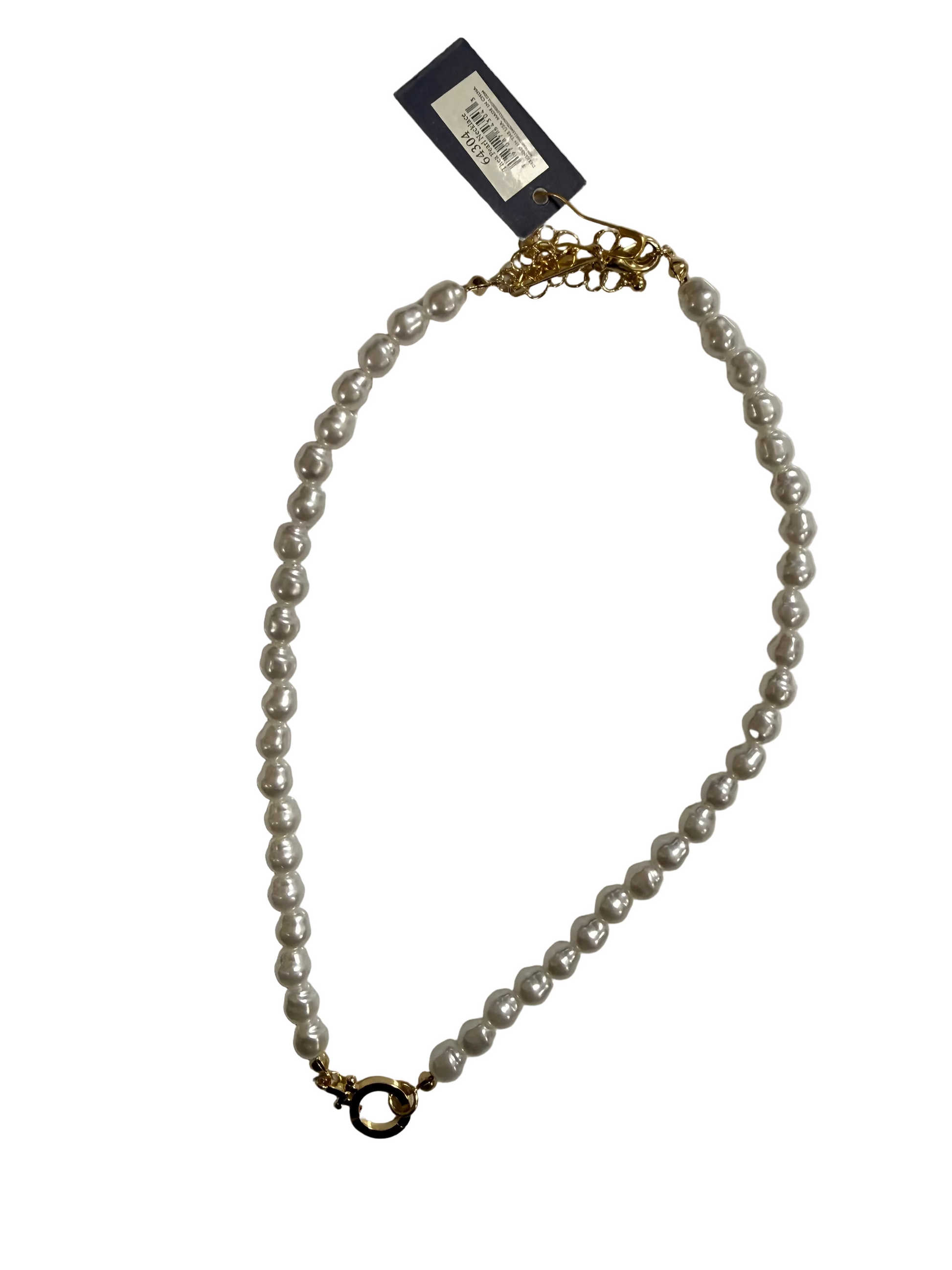 Pearl necklace with gold clasp on a white background