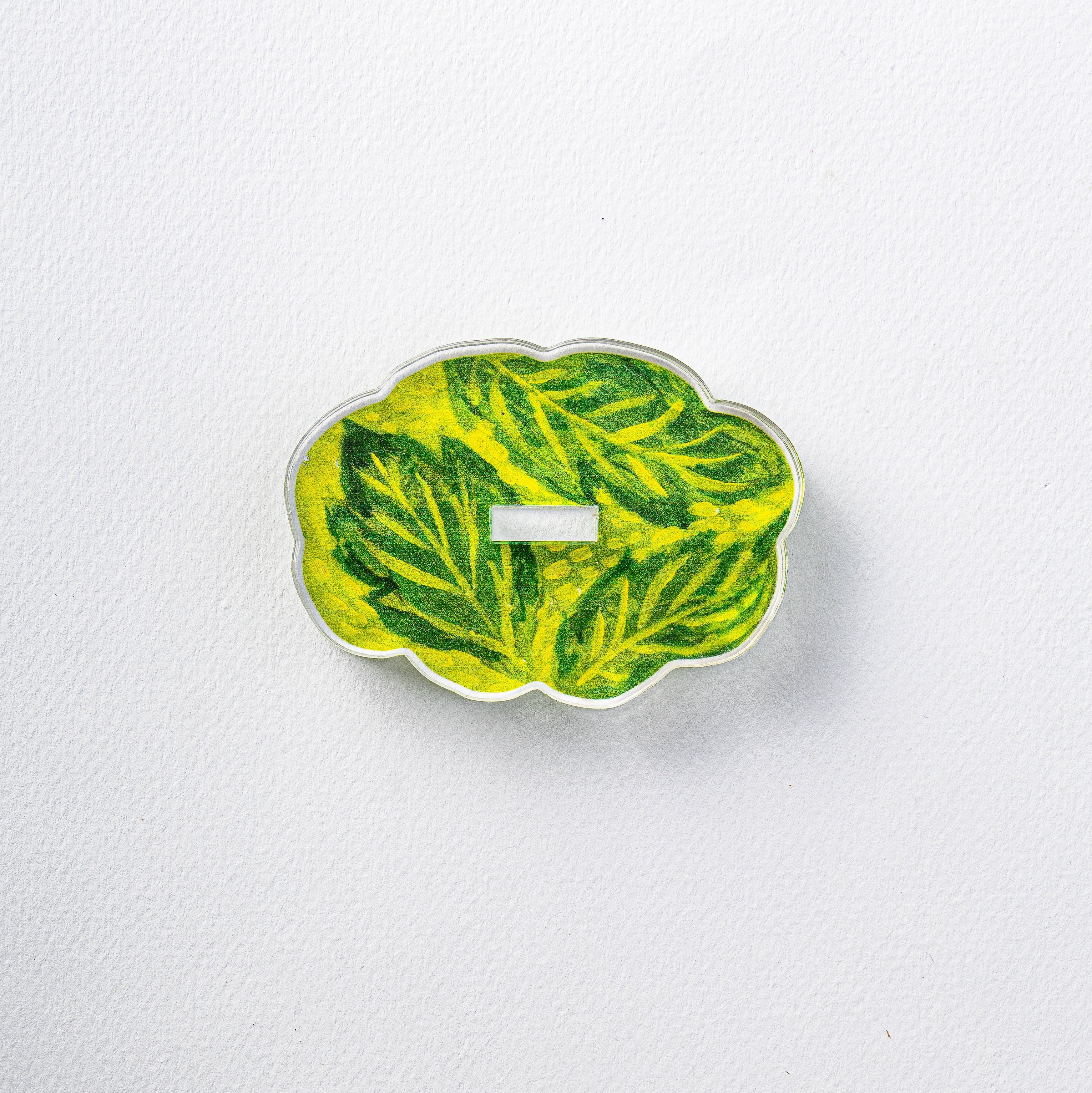 Decorative leaf-patterned object on a white background