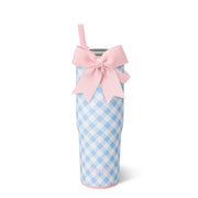 Blue ggham insulated tumber cup with pink bow and strw on white background