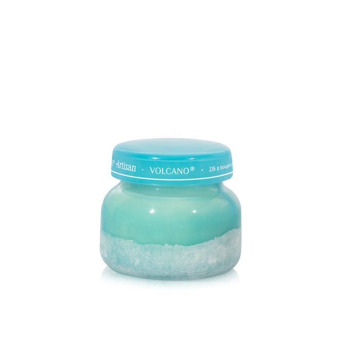 Blue glass jar candle on white background 