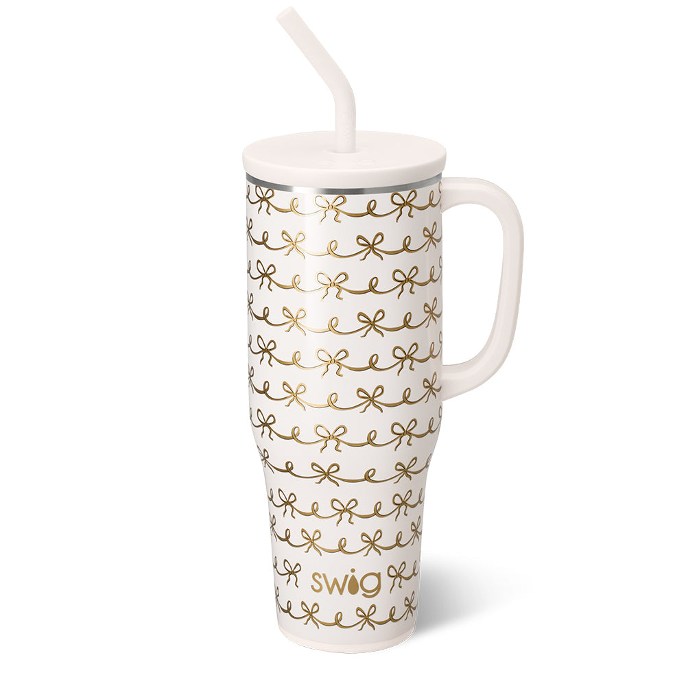 Mug - Mega - Pretty in Pearl - 40oz.- cup has gold bows with a white background and cup has a straw and handle 