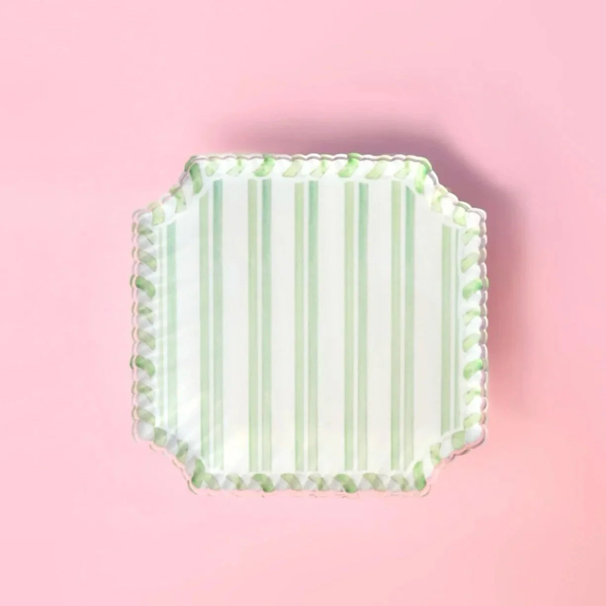 Acrylic clipped corner square coaster with green stripes on a pink background