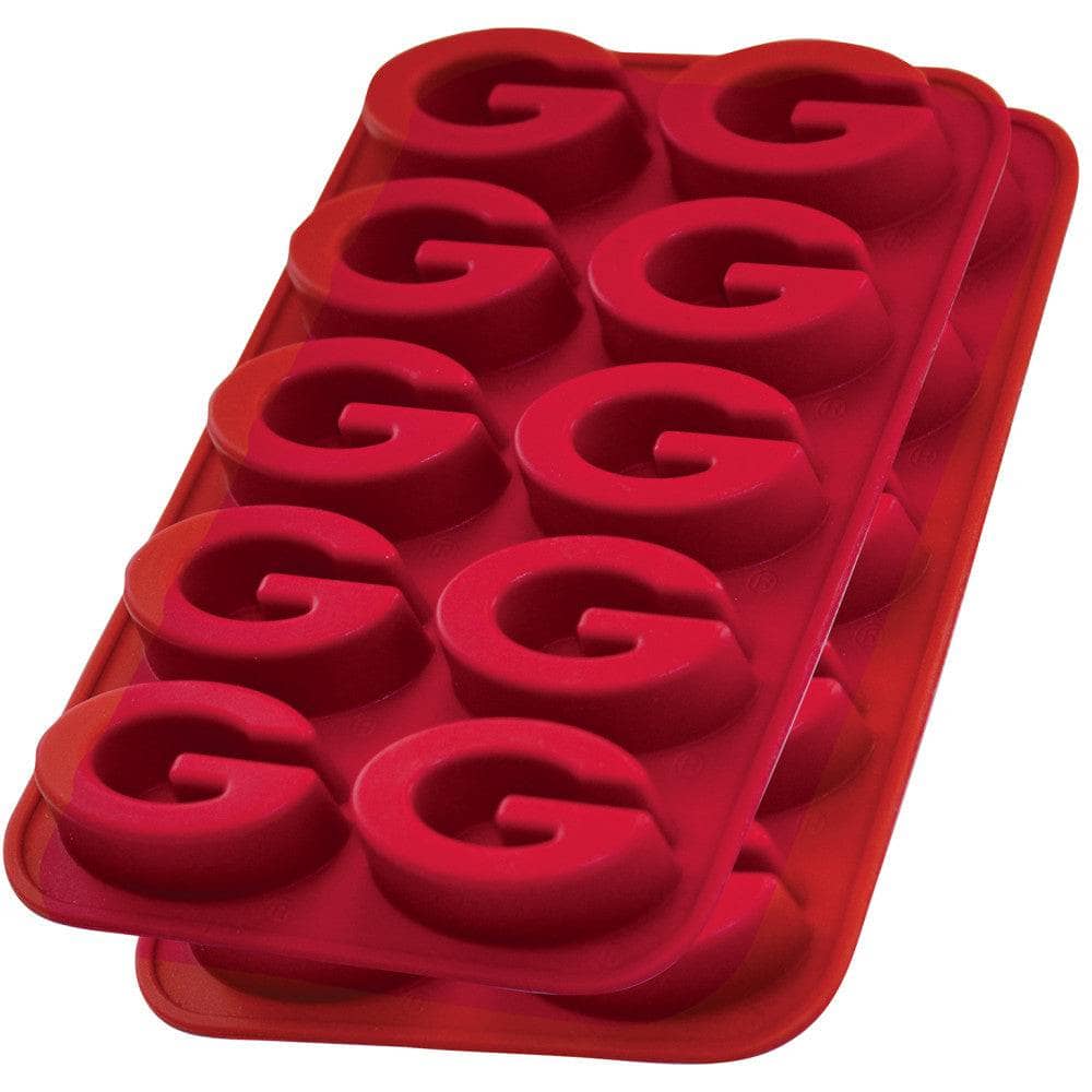 Red silicone mold with letter 'G' shapes on a white background