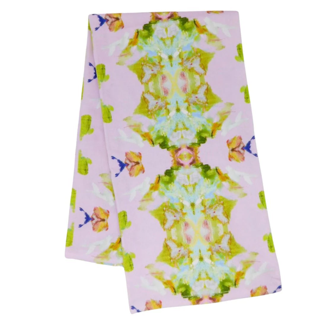 Tea Towel - Stained Glass Lavender- tea towel is pictured here folded with colorful design on a white background