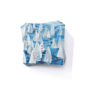 Pack of sailboat-themed paper napkins on a white background