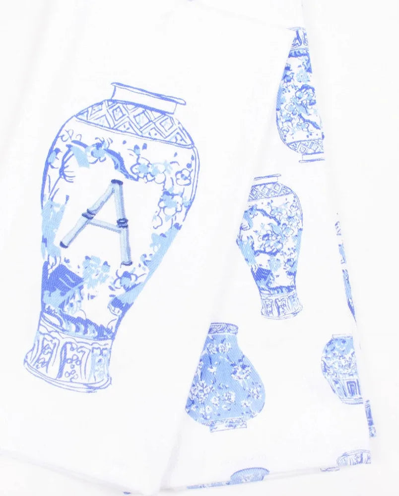 Blue and white ceramic vase design on a white background