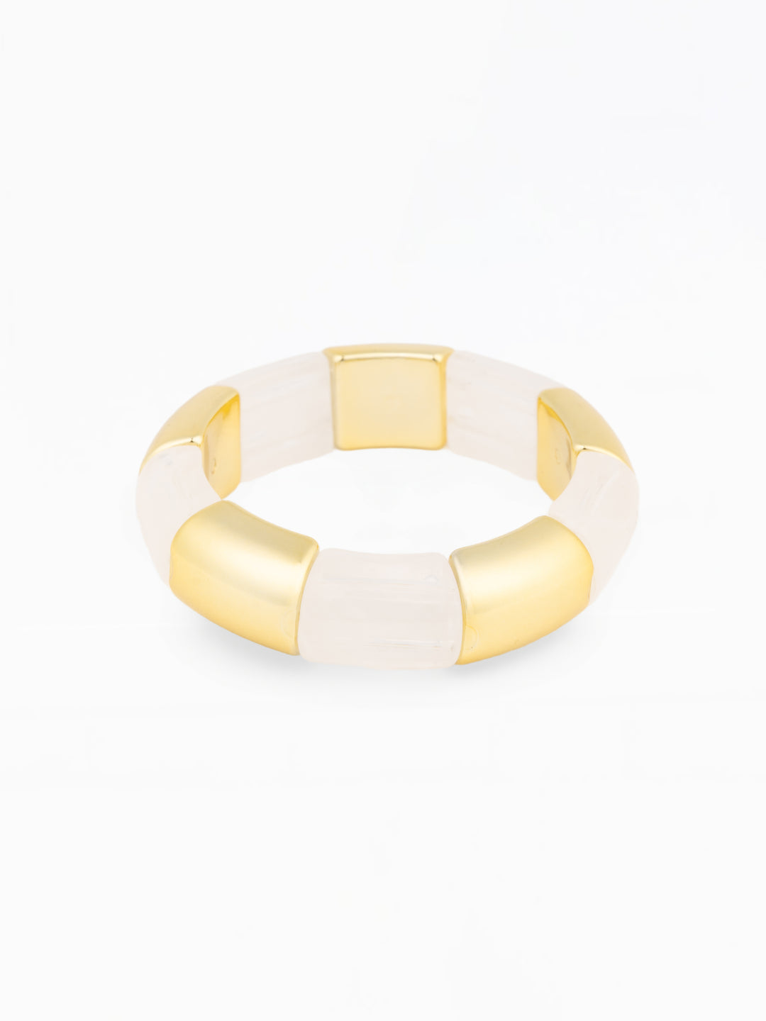 Gold and white bangle on a white background