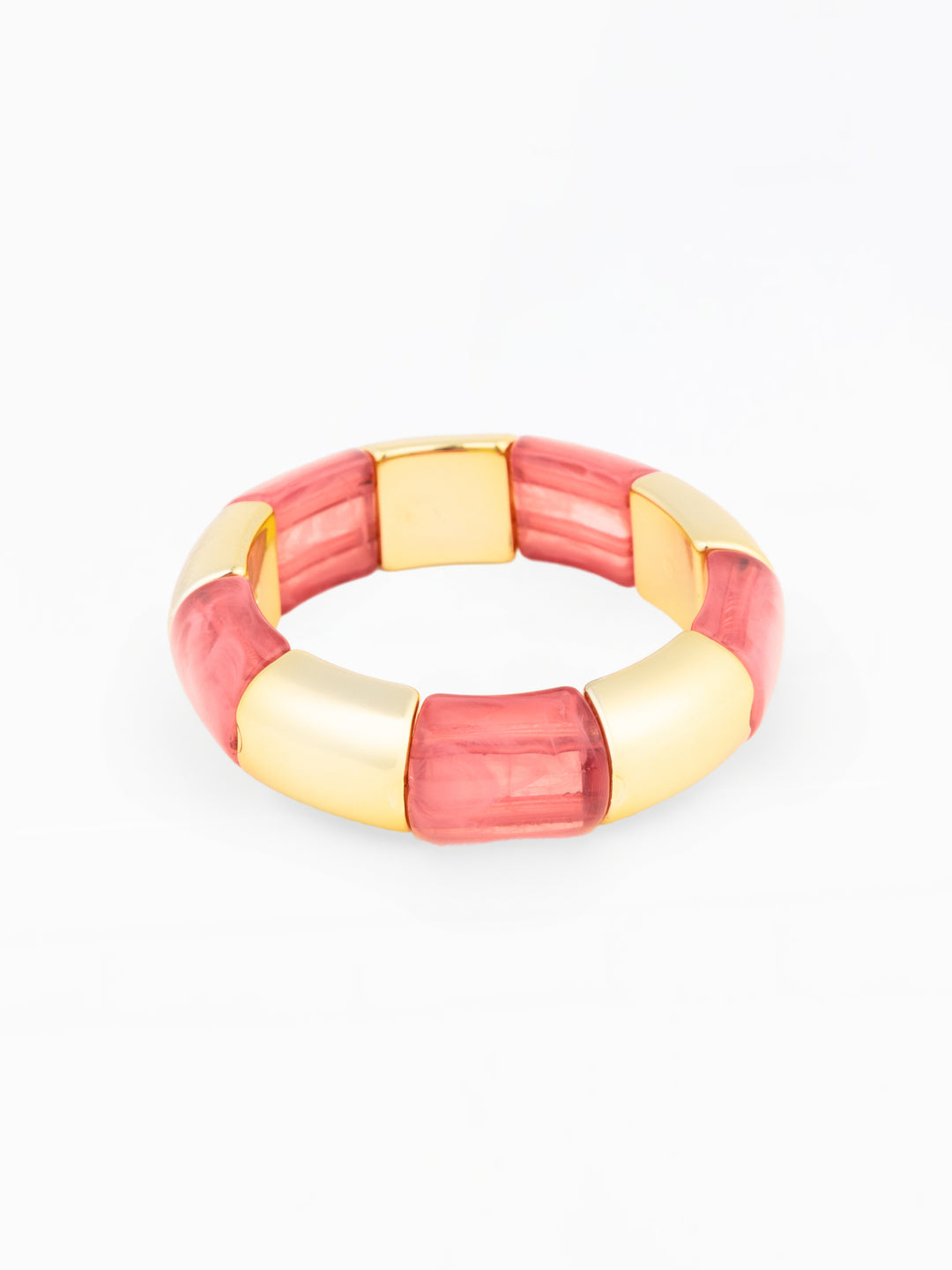 Pink and gold bracelet on a white background