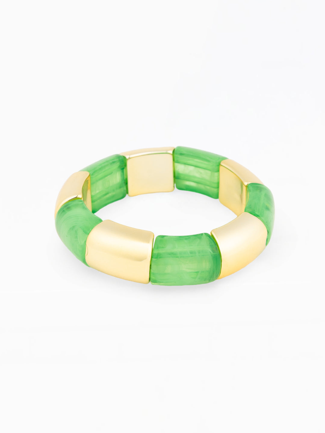 Green and gold bracelet on a white background