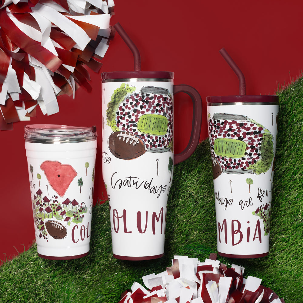 Gameday - Carolina Tumbler - 24oz. - photo is a grass and red background with 3 tumbler styles 