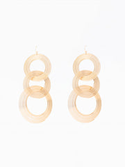 Pair of gold hoop earrings on a white background