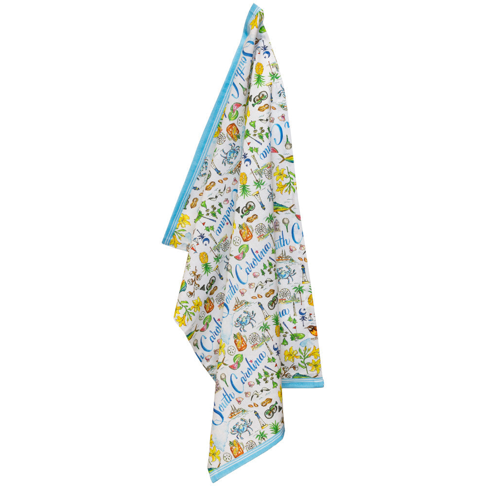 Colorful towel with various patterns and text on a white background