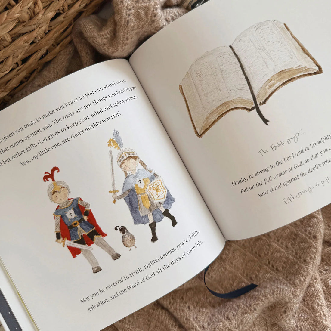 Open book with illustrations of armored figures on a textured surface