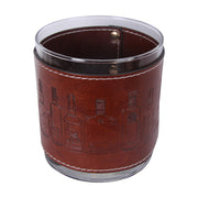 Clear glass with brown leather sleeve featuring embossed designs on a white background