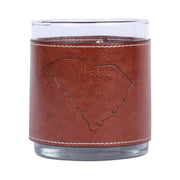 brown leather cover on a drinking glass featuring a South Carolina map design on a white background