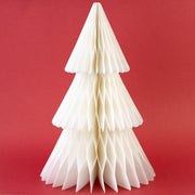 White paper Christmas tree on a red background