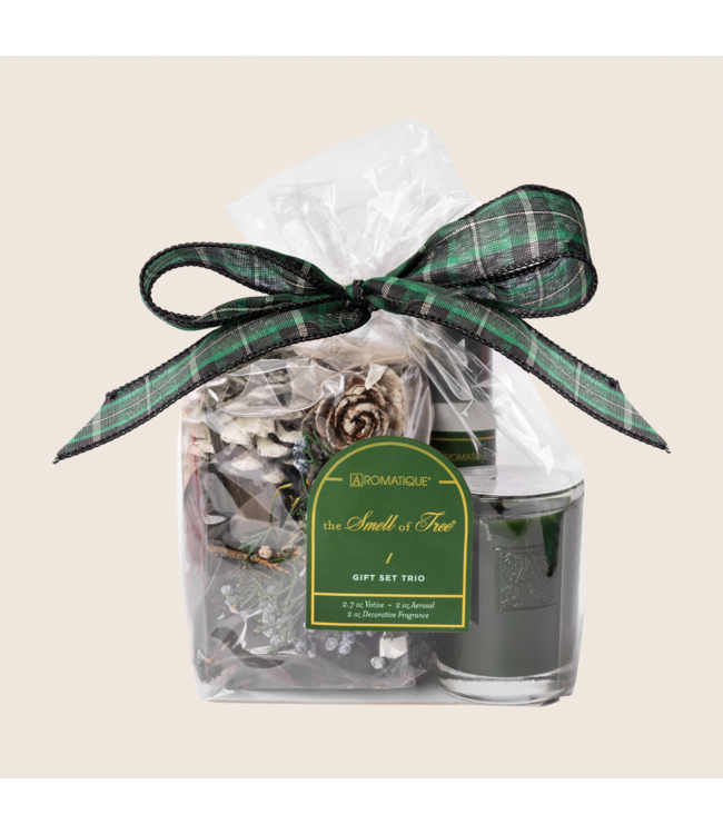 Seasonal - Smell of tree Gift Set showing candle, spray and potpourri that make up the set.  Tied in a clear bag with a green plaid bow. 