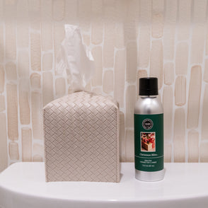 Seasonal - Room Spray - Christmas Bliss - silver spray can with green label.  Sitting on a shelf with ivory tile backsplash 