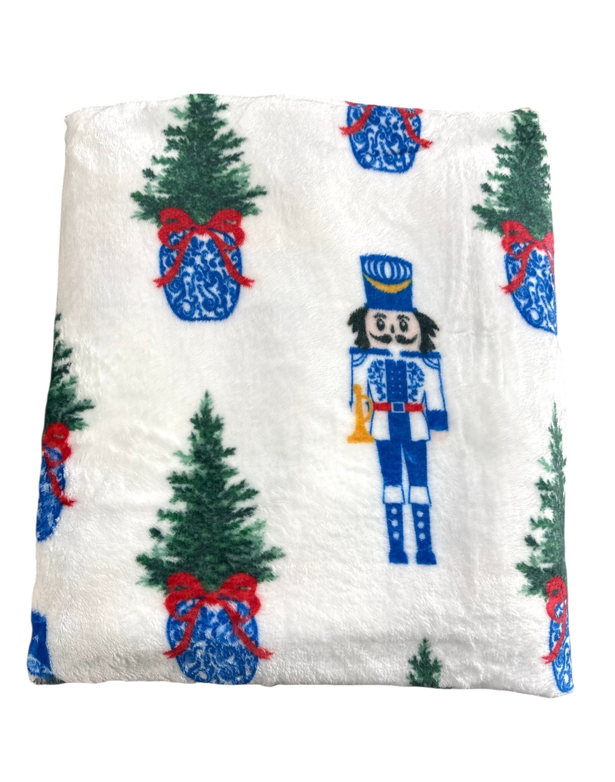 Picture 2 - white blanket folded with nutcracker and tree design 