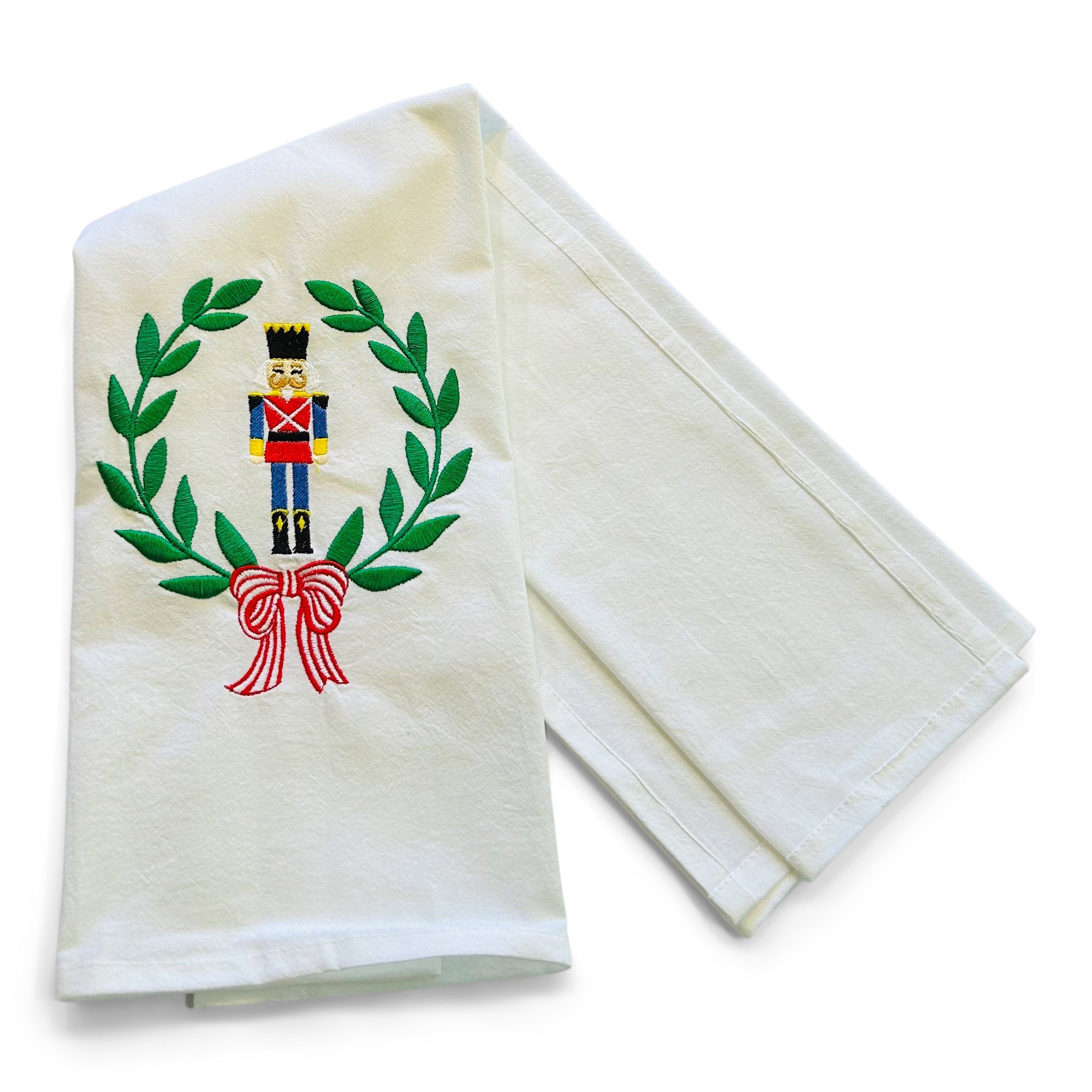 Seasonal - Tea Towel - embroidered Nutcracker in Laurel Wreath 