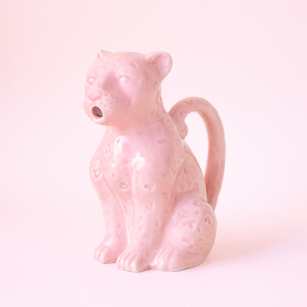 Pitcher - Leopard - 16 oz.- picture is of a light pink leopard with a handle on a pink background