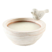 Wooden candle bowl with a decorative bird on a white background