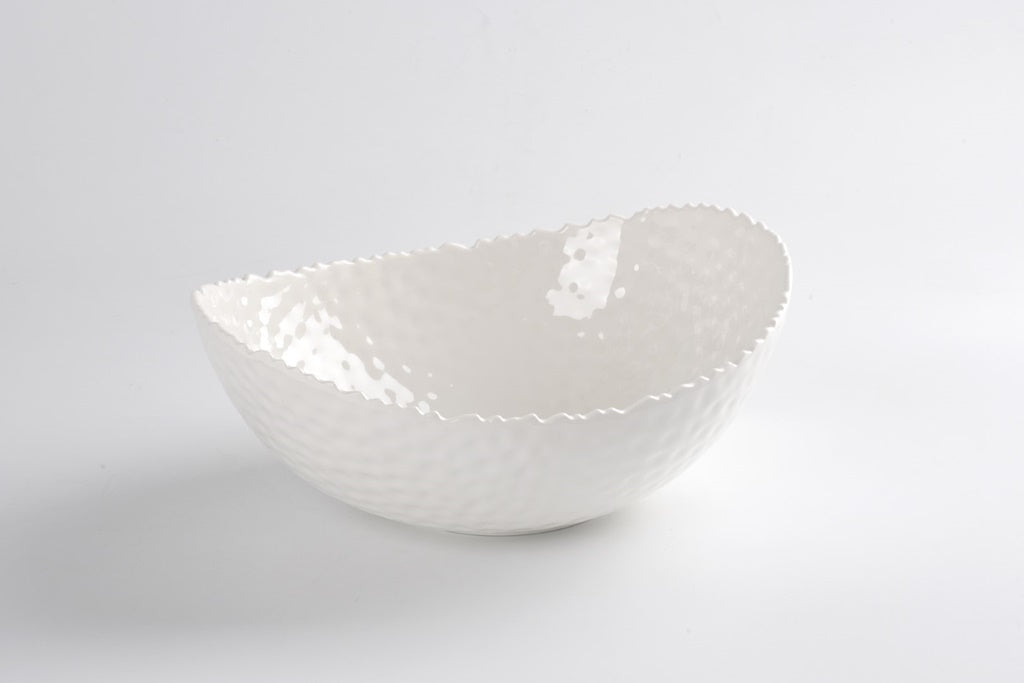 Large White melamine bowl by Pampa Bay on a light gray background