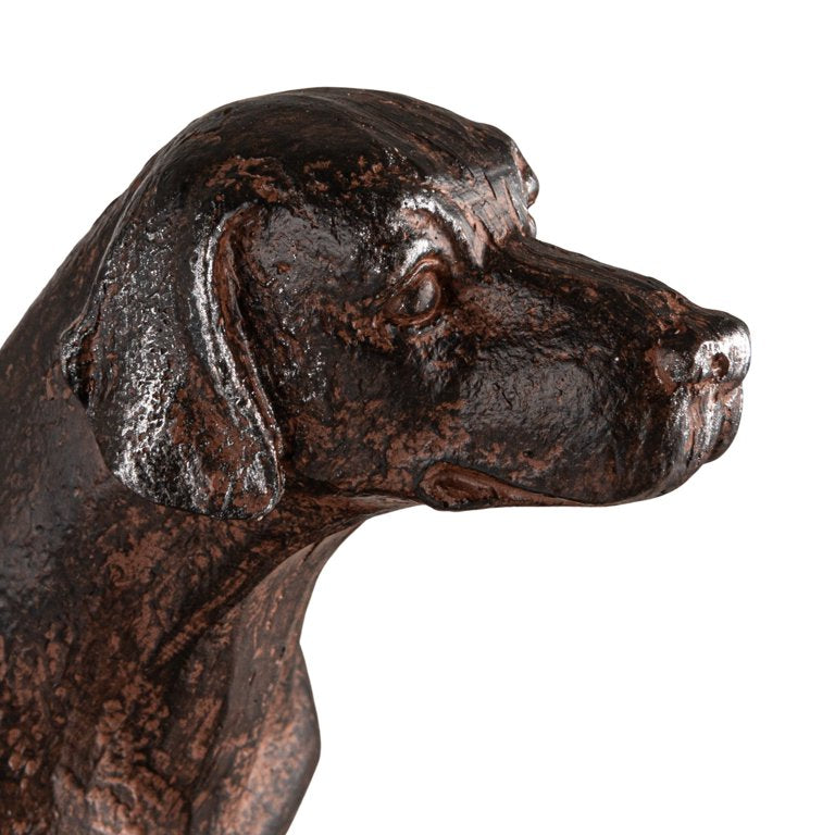 Resin statue of a dog's head on a white background