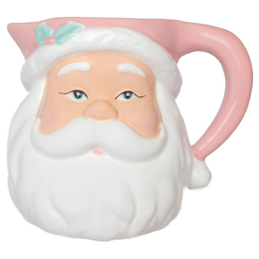 Pitcher shaped like a face with a beard, pink hat, and handle on a white background