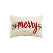 Decorative pillow with 'merry' text and Christmas tree designs on a white background