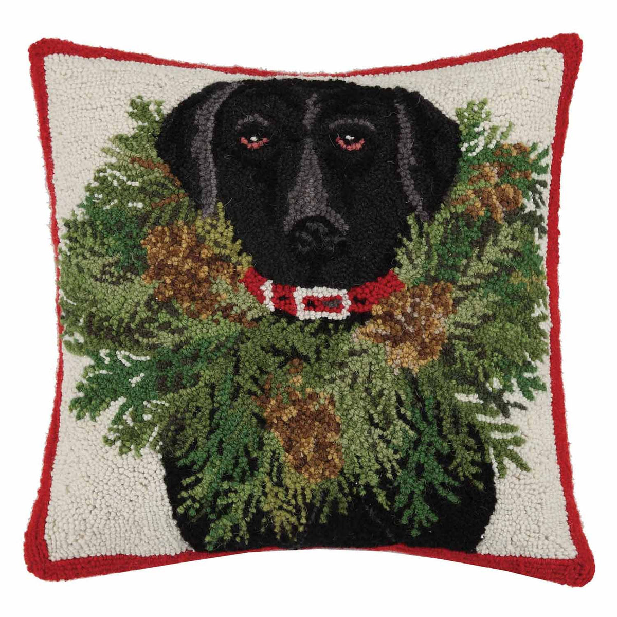Decorative pillow with a black dog surrounded by greenery and red border