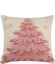 Decorative pillow with pink Christmas tree design on a beige background