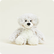 Plush teddy bear on a light beige background