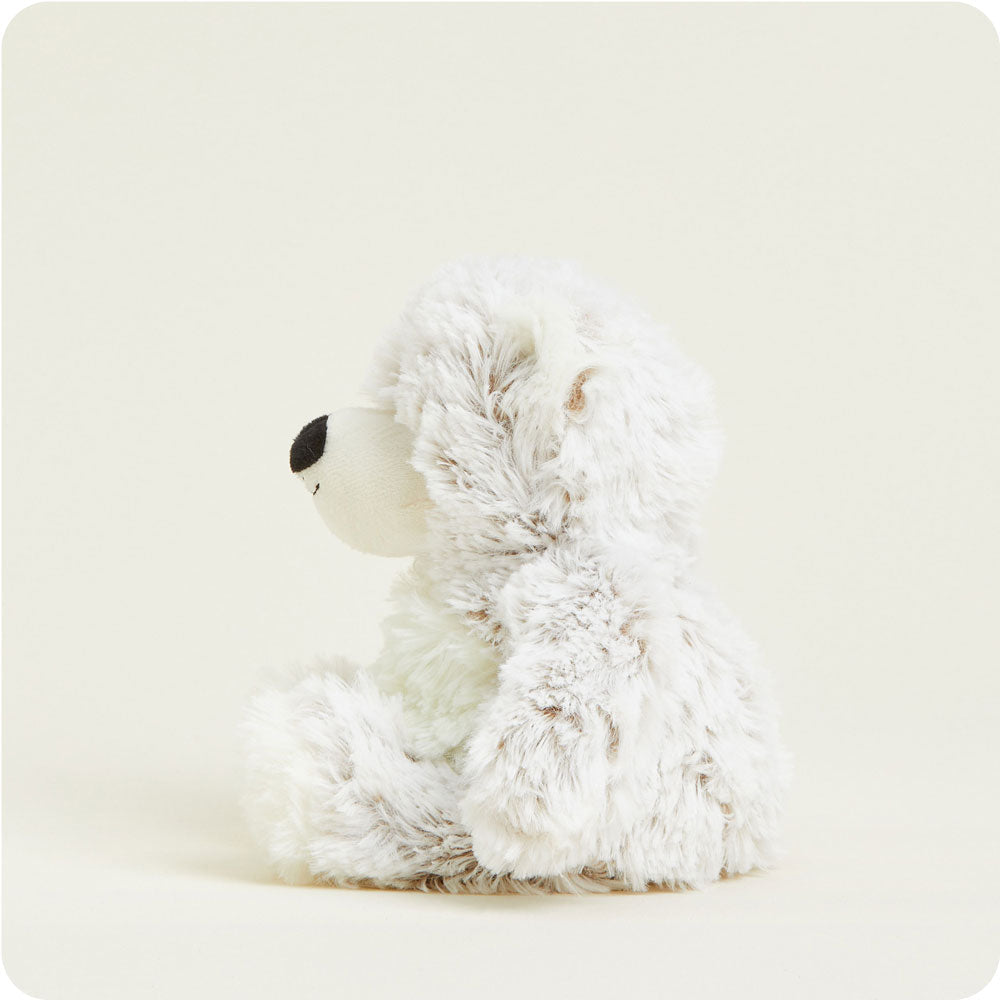 White plush bear toy on a white background