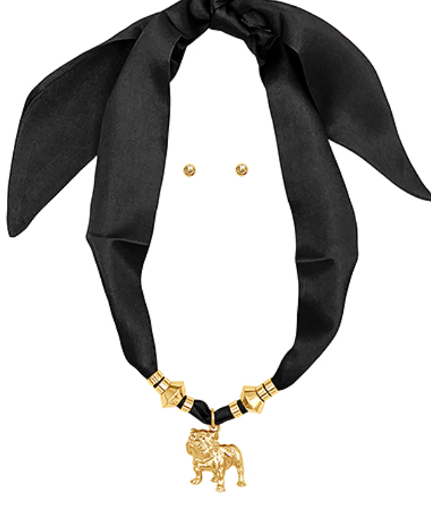Black ribbon with gold necklace and earrings on a white background Grace Ann Design