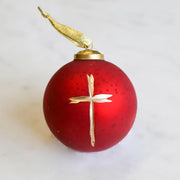 Red ornament with gold cross 
