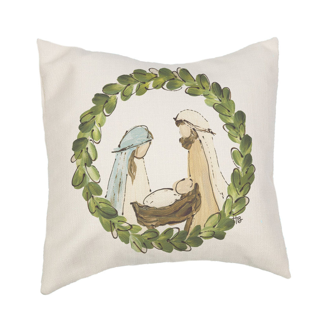 Decorative pillow with a nativity scene design on a white background