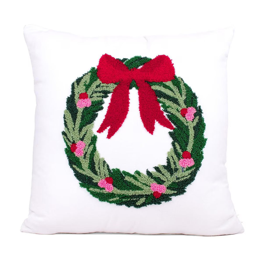 Decorative pillow with a Christmas wreath design on a white background