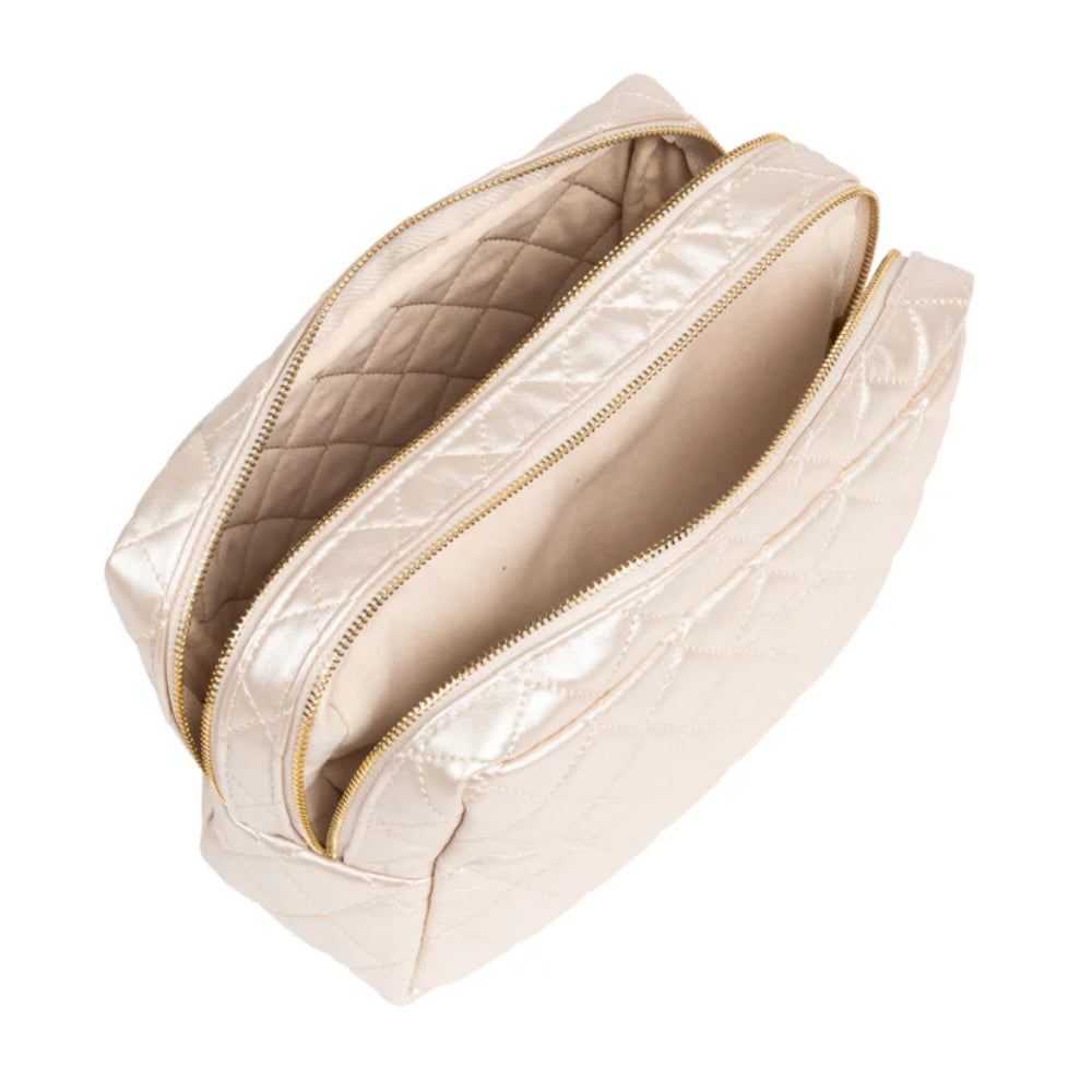 Beige quilted cosmetic bag with a zipper on a white background