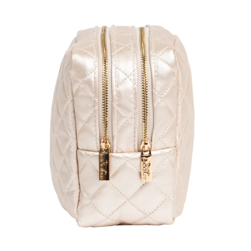 Quilted cosmetic bag with gold zipper on a white background
