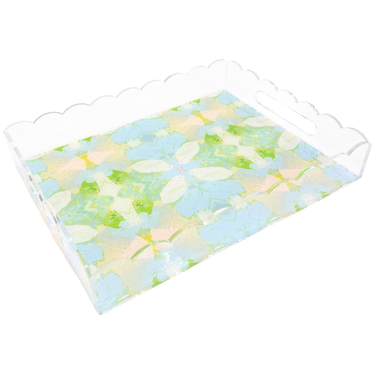 Floral-patterned tray with scalloped edge on a white background