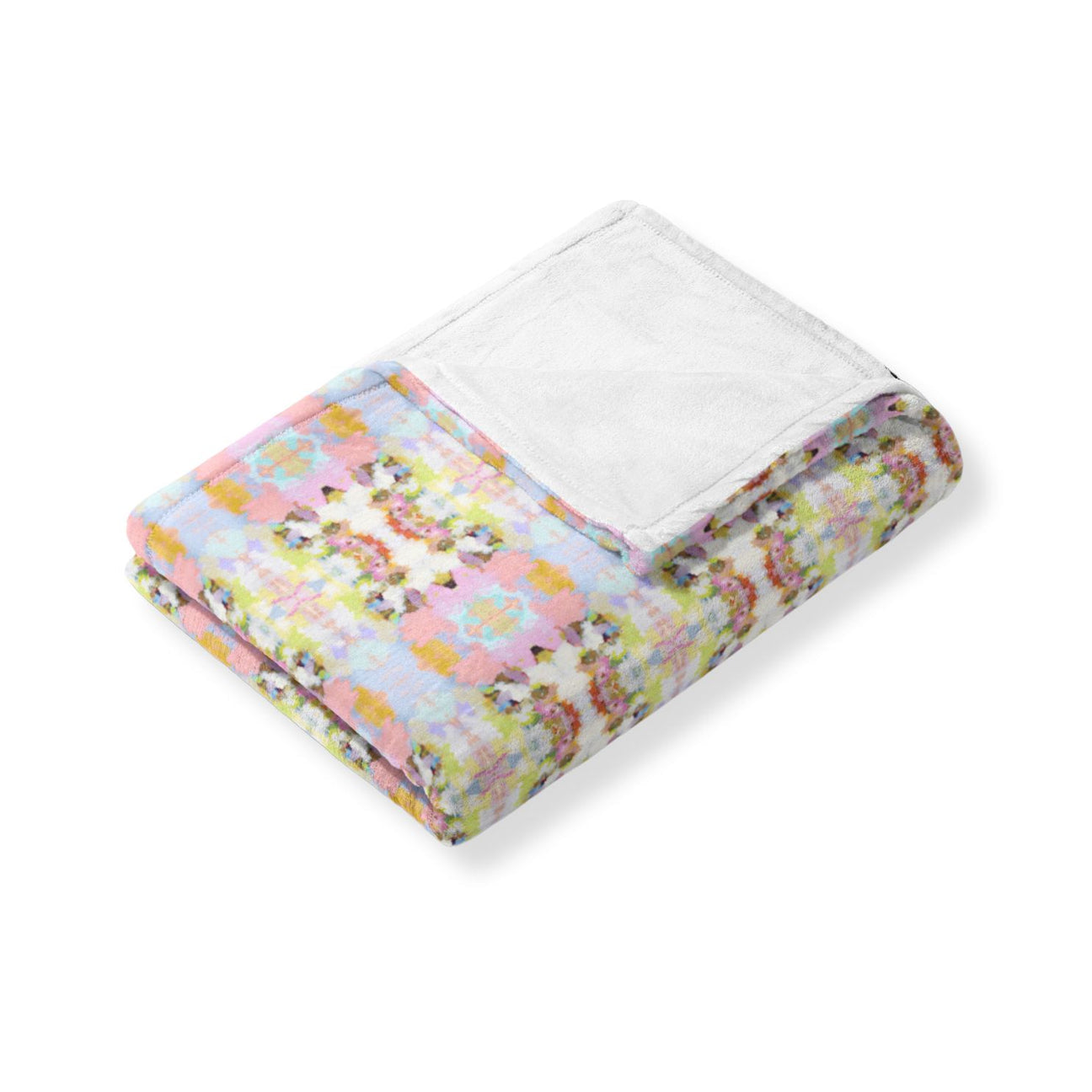 Floral patterned quilt on a white background