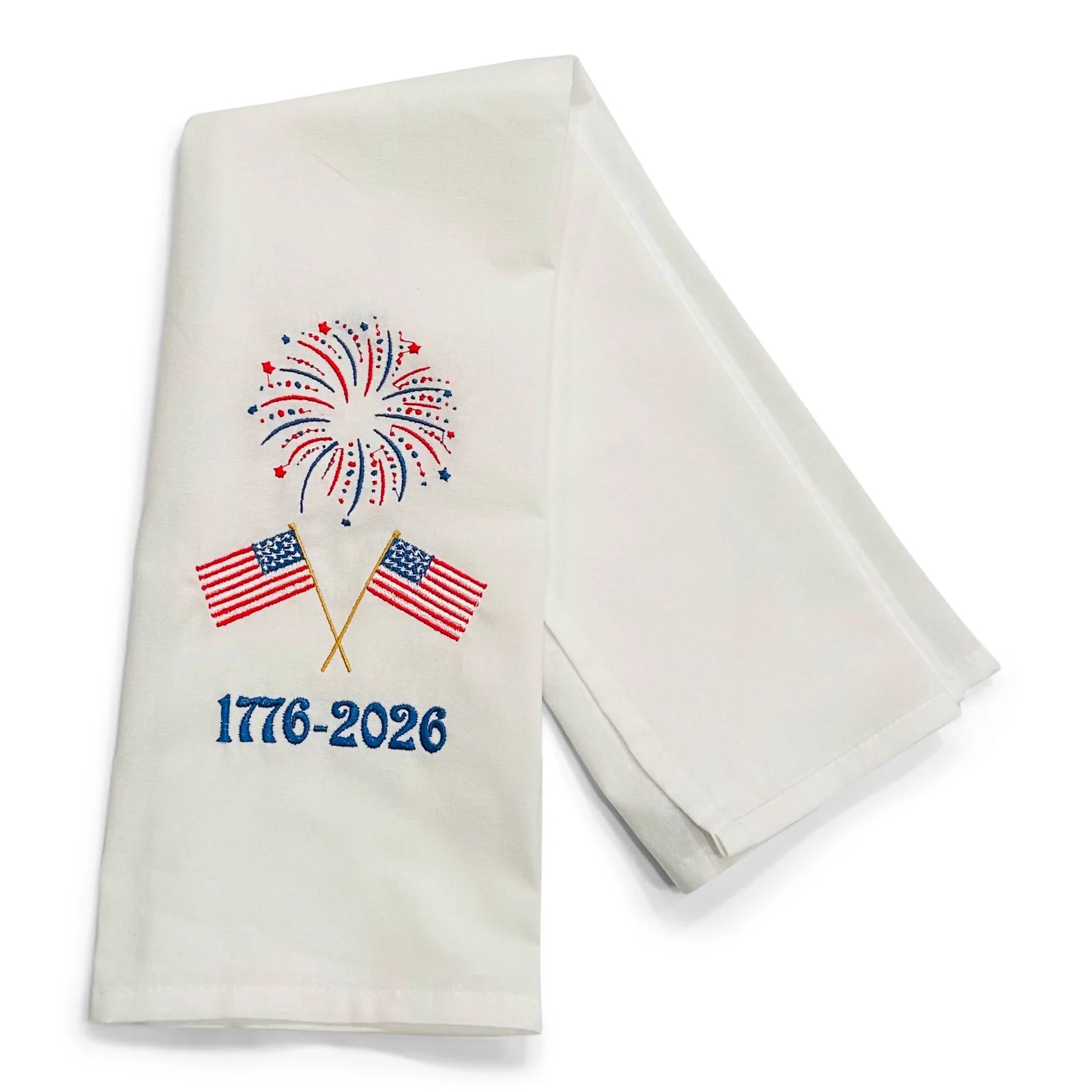 White towel with American flags, fireworks, and '1776-2026' text on a white background